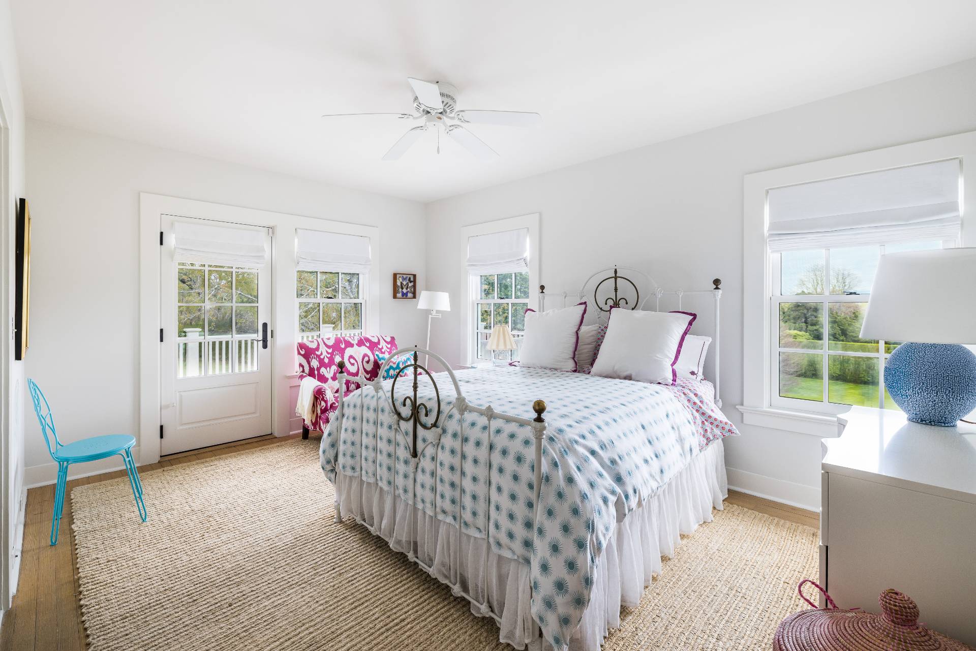 17 Apaquogue Road East Hampton, NY 11937 - Photo 28 of 37 a bedroom with bed wooden floor and windows