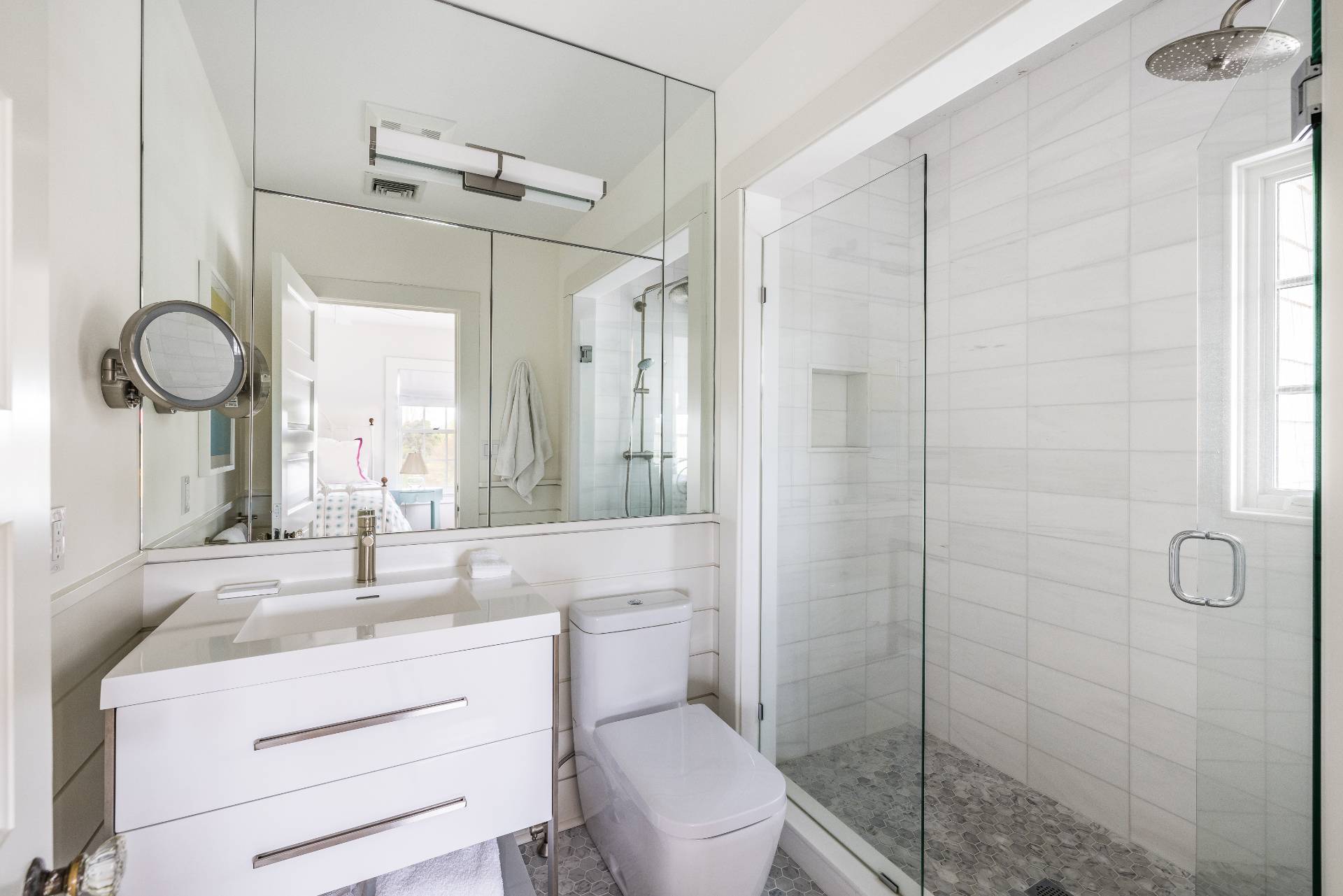 17 Apaquogue Road East Hampton, NY 11937 - Photo 30 of 37 a bathroom with a sink toilet and shower