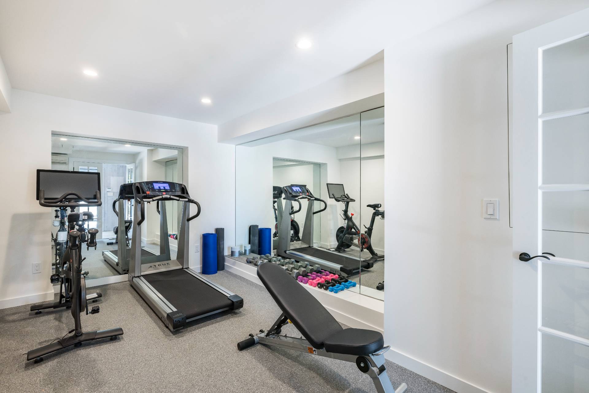 17 Apaquogue Road East Hampton, NY 11937 - Photo 33 of 37 a view of a room with gym equipment