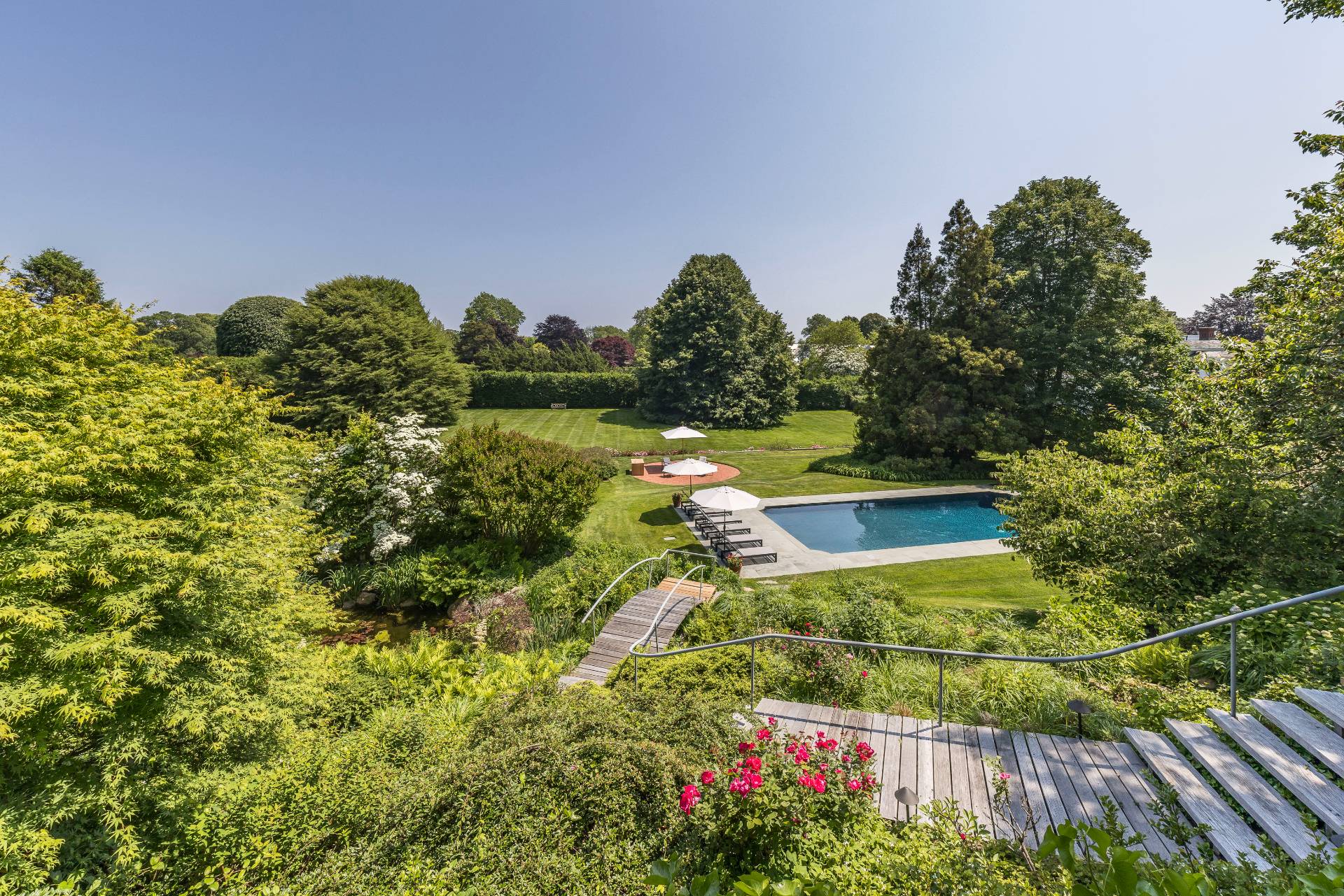 17 Apaquogue Road East Hampton, NY 11937 - Photo 10 of 37 a view of a houses with a yard