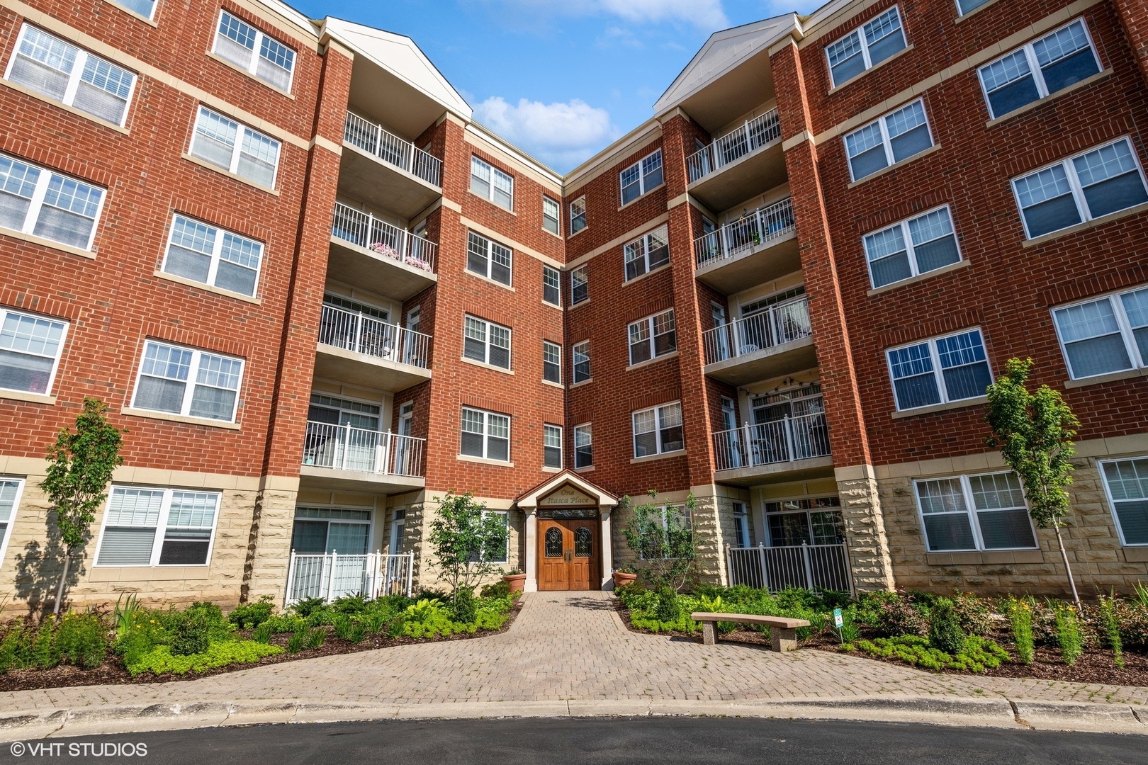 1 Itasca Road, Unit 101 Itasca, IL 60143 - Photo 1 of 21 a front view of a building