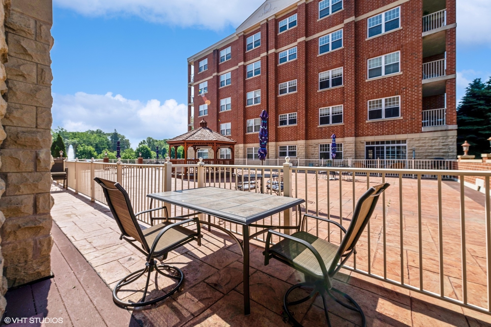 1 Itasca Road, Unit 101 Itasca, IL 60143 - Photo 19 of 21 a view of a chairs and table in the balcony