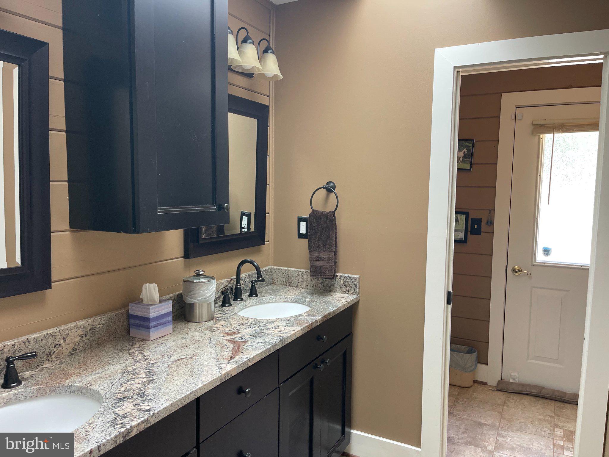7747 Riverside Farm Road Marshall, VA 20115 - Photo 24 of 69 Elegant dual-sink bathroom retreat.
