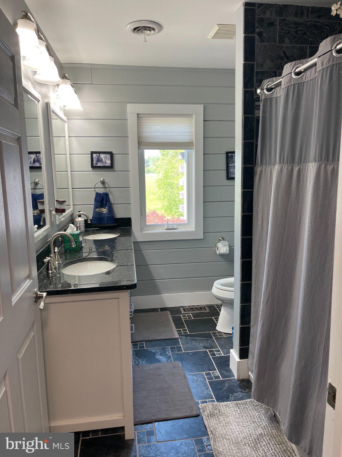 7747 Riverside Farm Road Marshall, VA 20115 - Photo 27 of 69 Charming bathroom with modern touches.