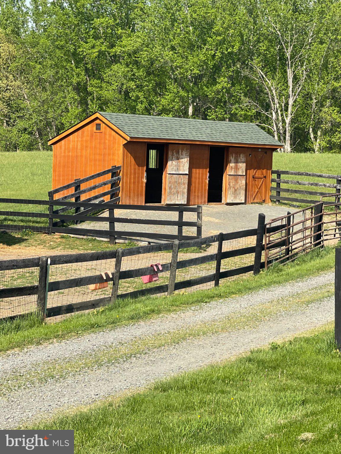 7747 Riverside Farm Road Marshall, VA 20115 - Photo 58 of 69 Charming barn nestled in lush greenery.