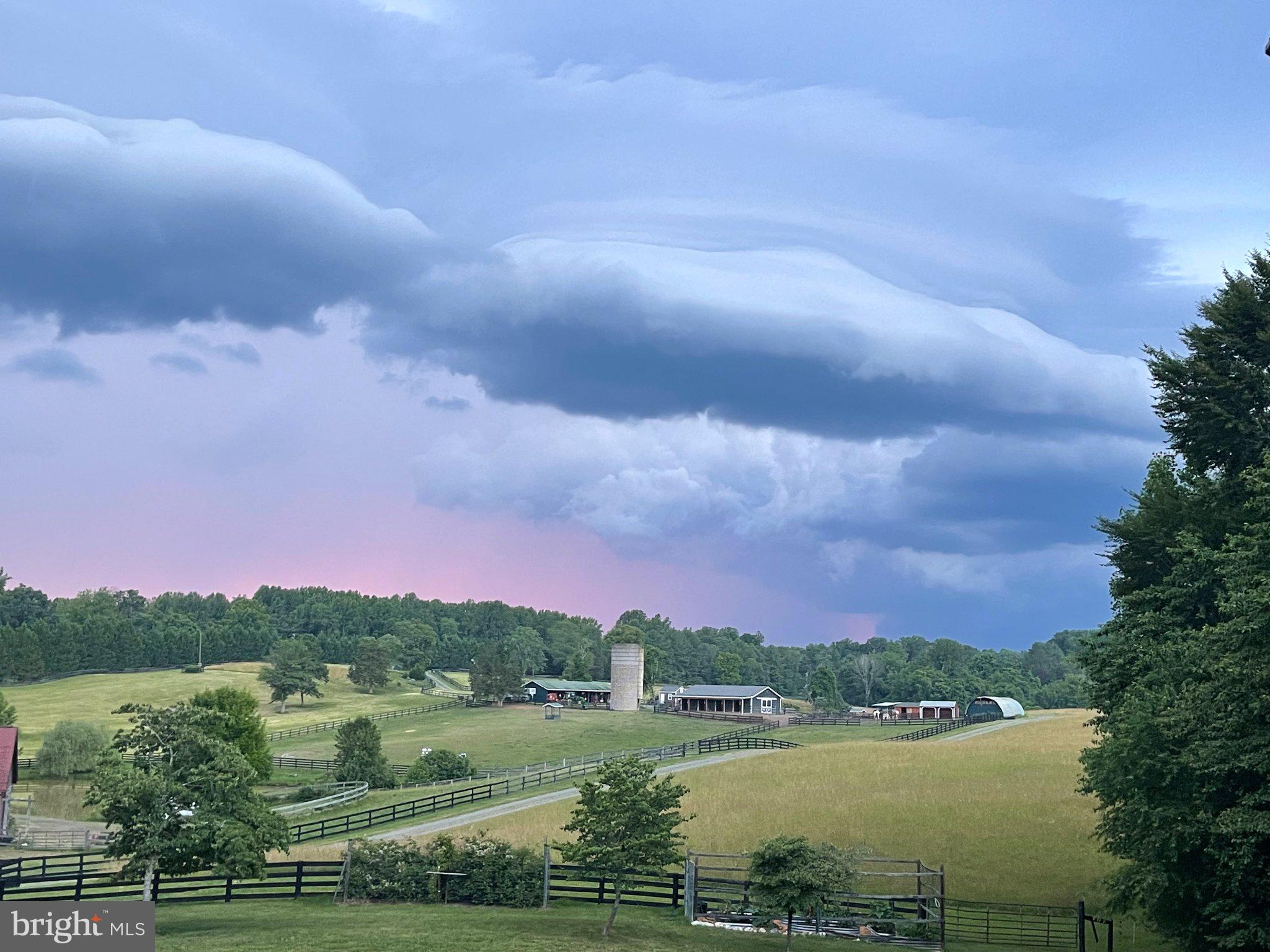 7747 Riverside Farm Road Marshall, VA 20115 - Photo 64 of 69 Stormy skies over tranquil fields.
