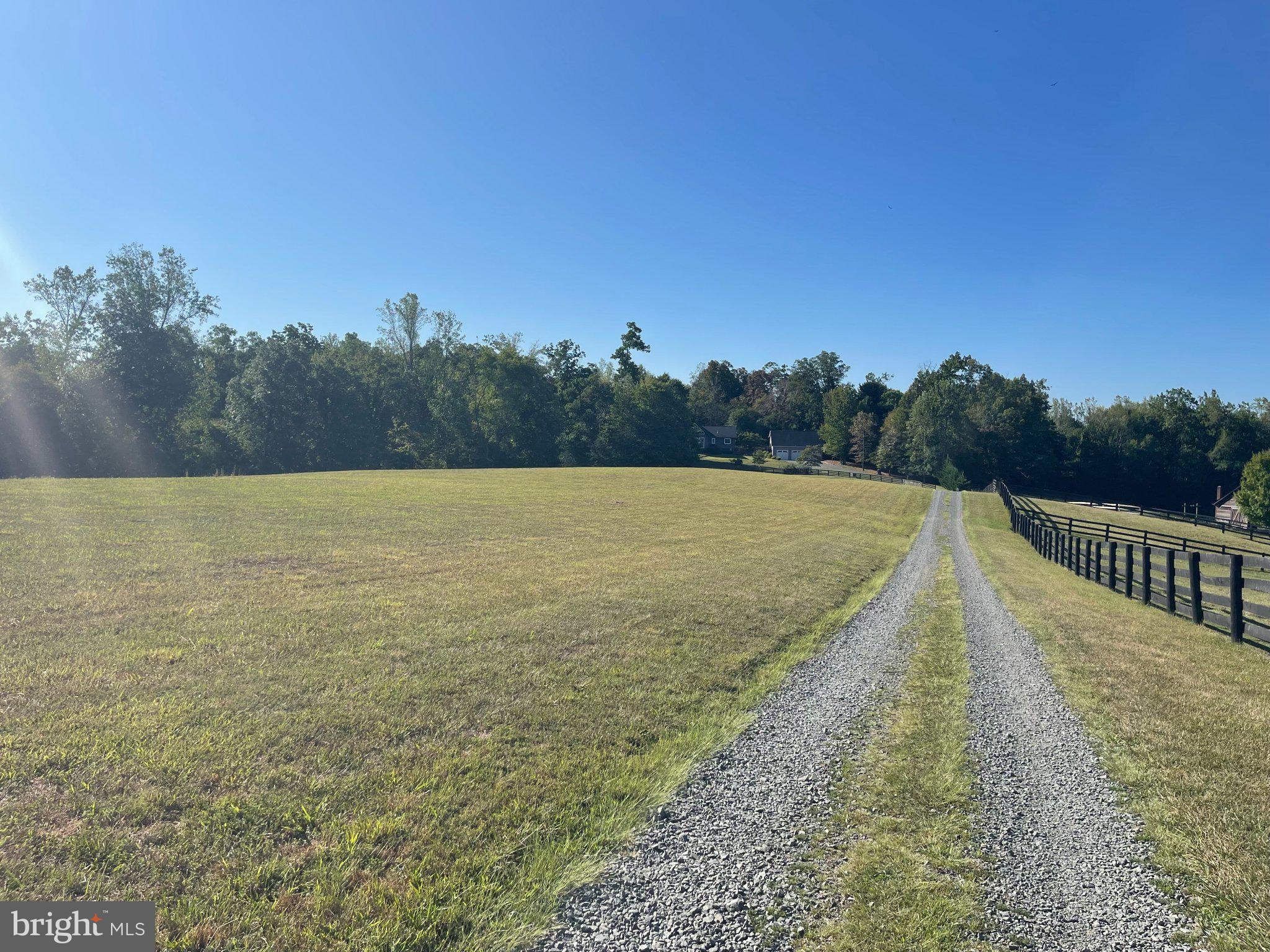 7747 Riverside Farm Road Marshall, VA 20115 - Photo 66 of 69 Tranquil gravel path through fields.