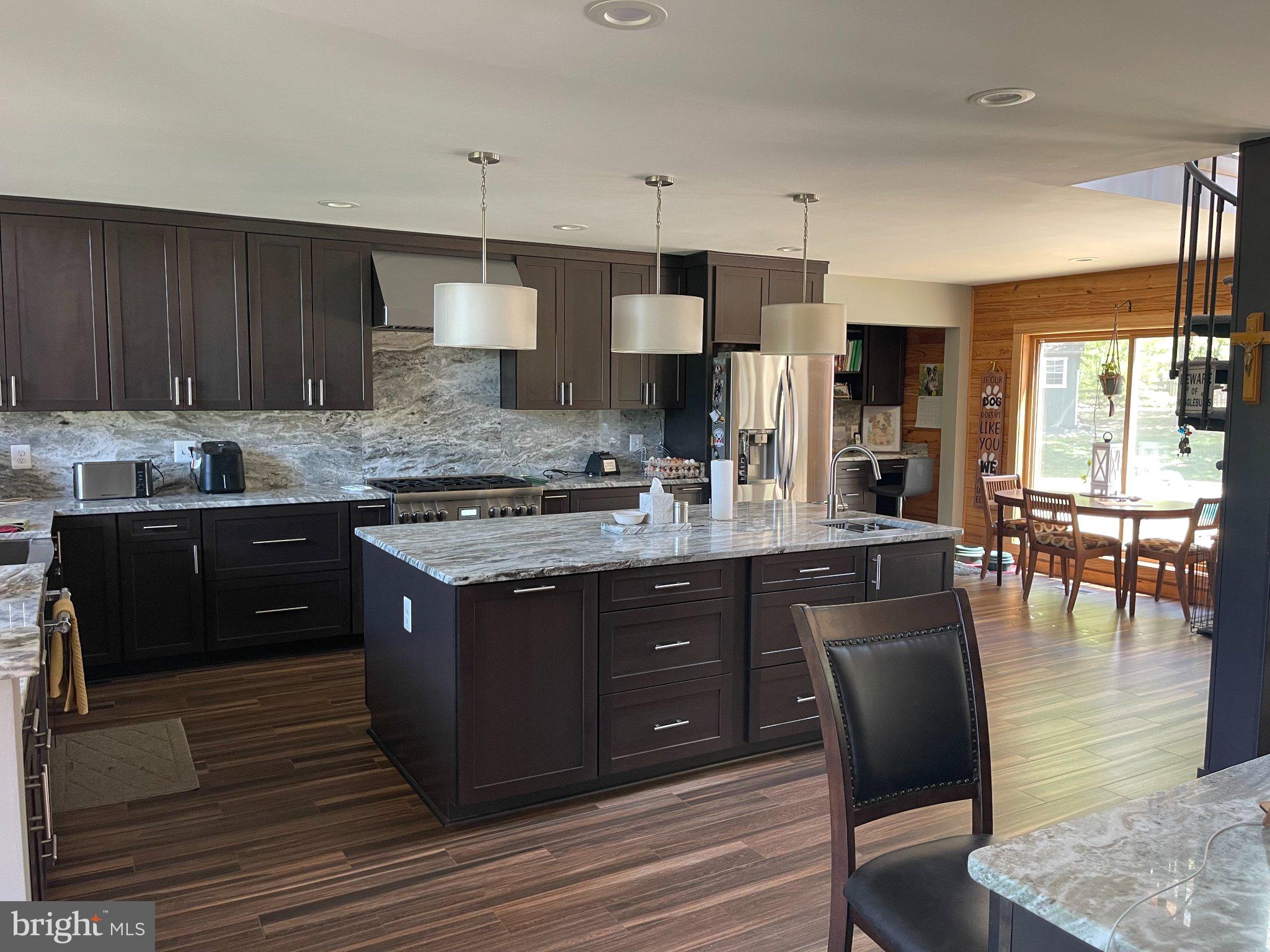 7747 Riverside Farm Road Marshall, VA 20115 - Photo 8 of 69 Modern kitchen with sleek finishes.