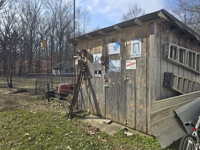 a view of a balcony with wooden floor