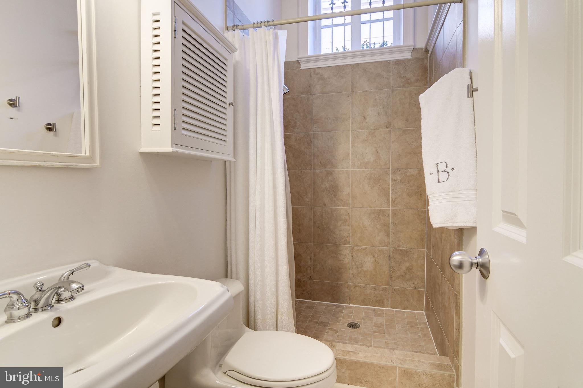 1408 Q Street Northwest, Unit 1 Washington, DC 20009 - Photo 14 of 20 Owner's Bath w/ Linen Closet