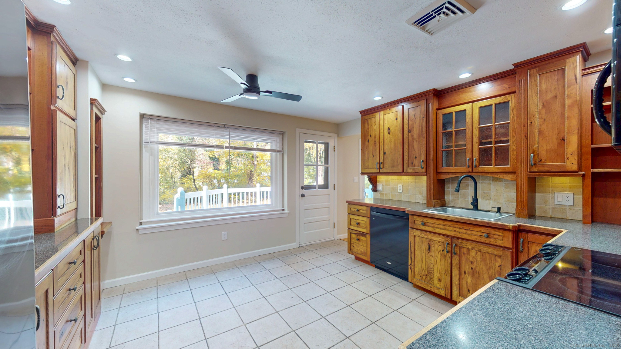 9 Old Farms Road Madison, CT 06443 - Photo 13 of 36 a open kitchen with sink window and cabinets