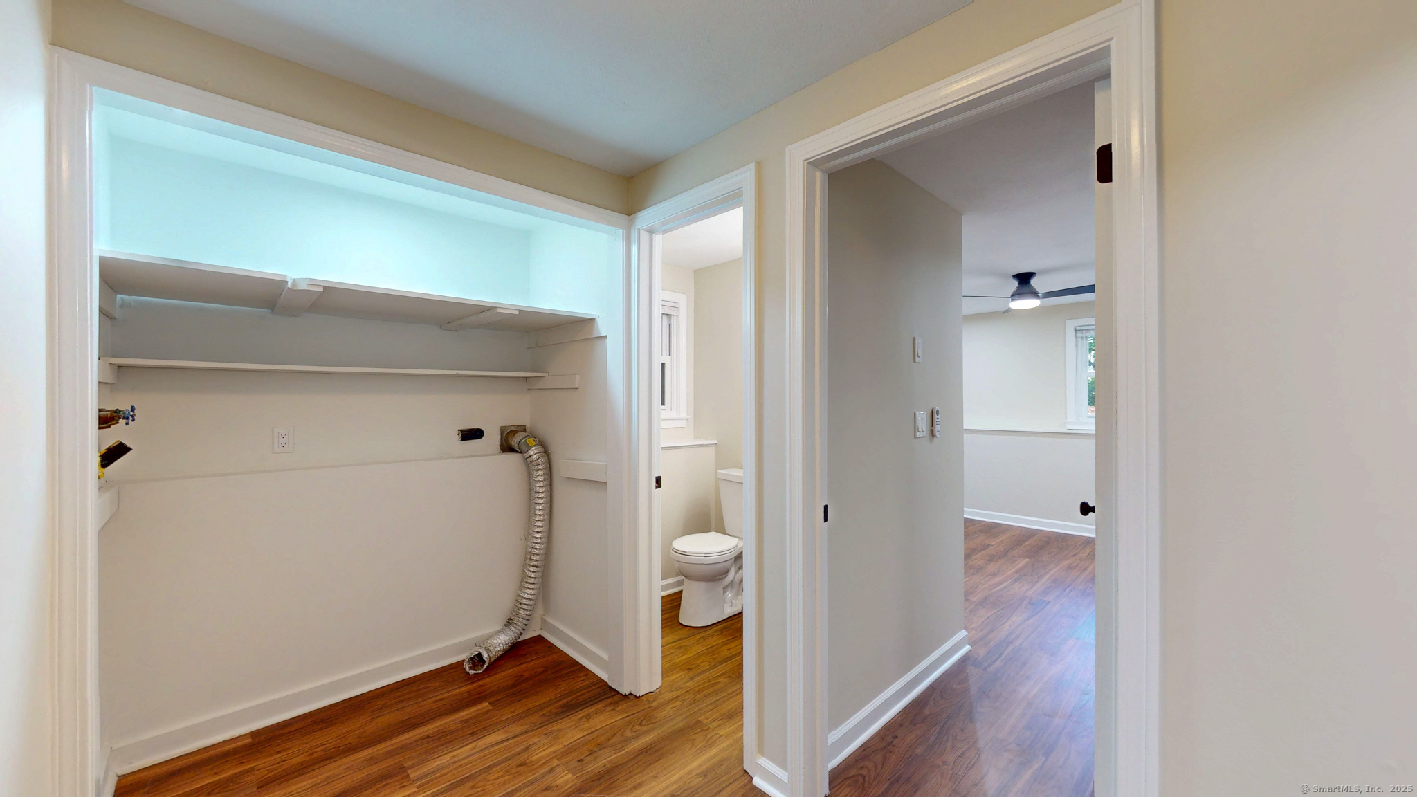 9 Old Farms Road Madison, CT 06443 - Photo 26 of 36 a view of room with wooden floor