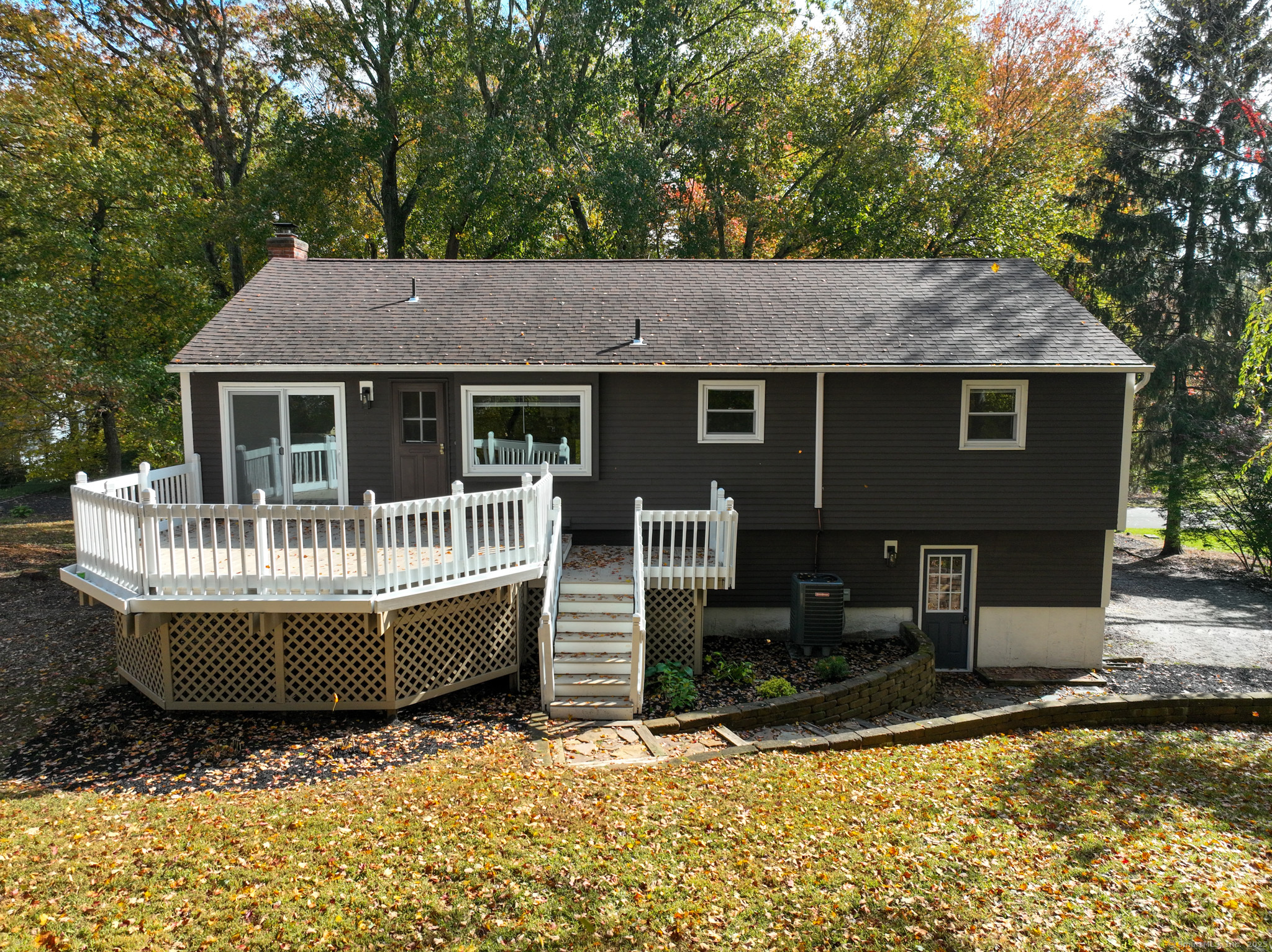 9 Old Farms Road Madison, CT 06443 - Photo 31 of 36 a front view of a house with a porch