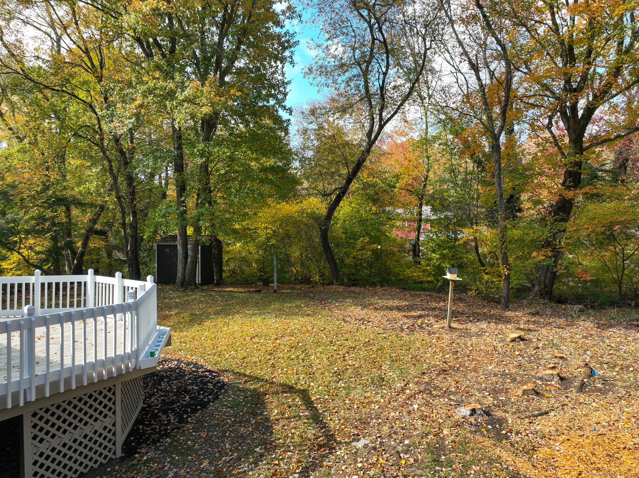 9 Old Farms Road Madison, CT 06443 - Photo 33 of 36 a backyard of a house with trees