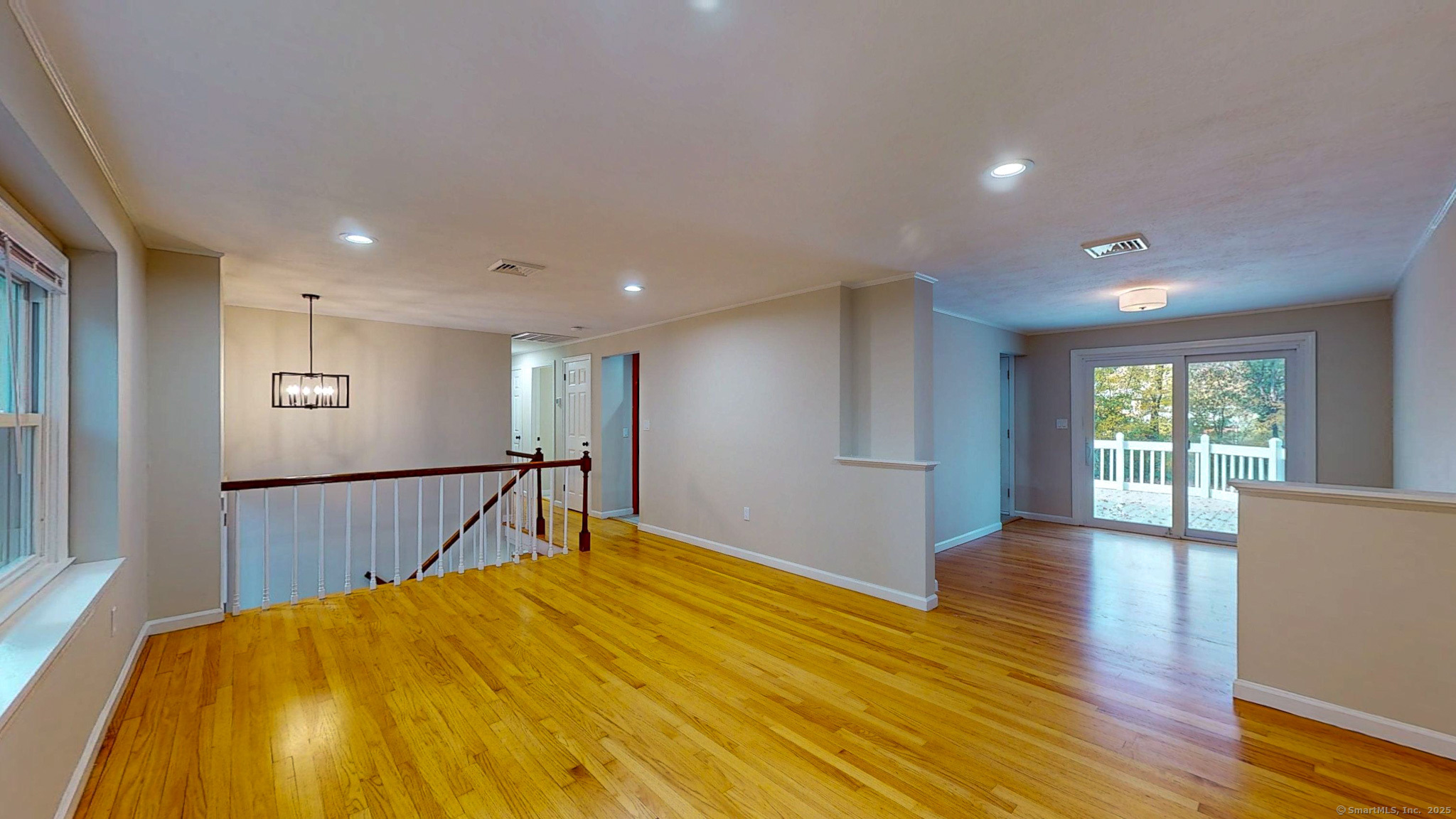9 Old Farms Road Madison, CT 06443 - Photo 5 of 36 a view of empty room with wooden floor