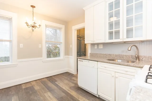 a bathroom with a sink and a window