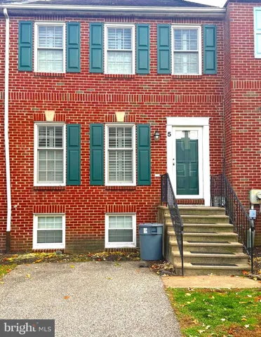 a front view of a house having yard