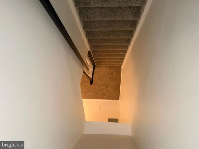 an empty room with a bathroom