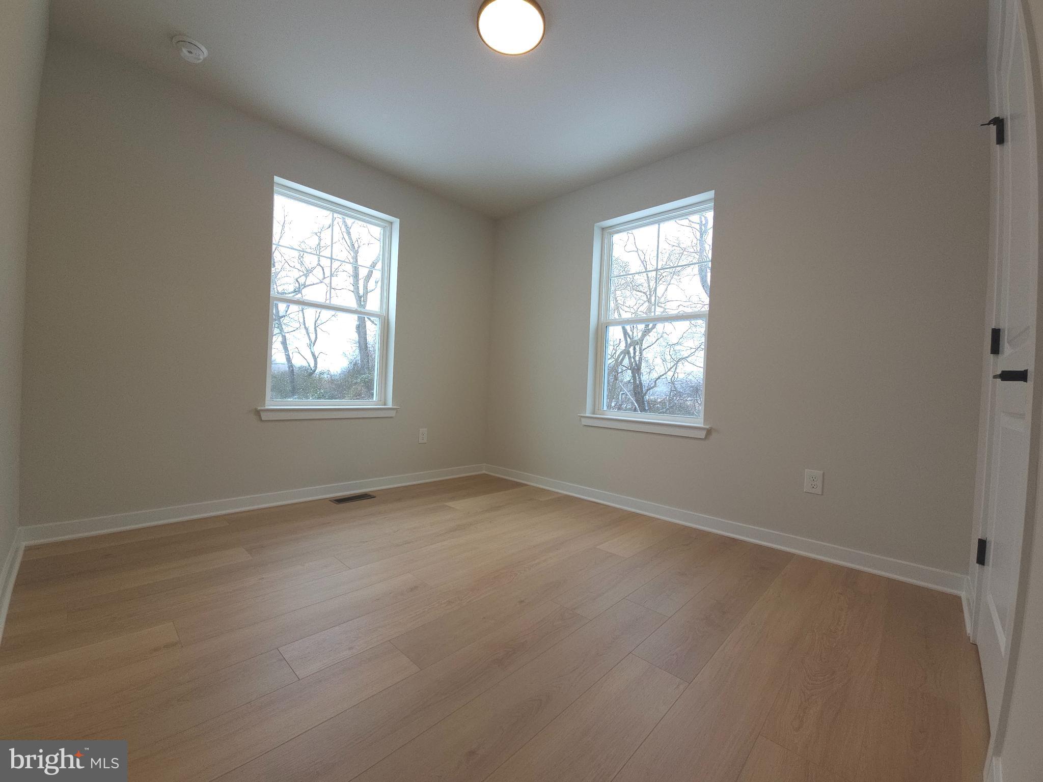 10 Fieldstone Court Bridgeton, NJ 08302 - Photo 14 of 31 an empty room with windows and mirror