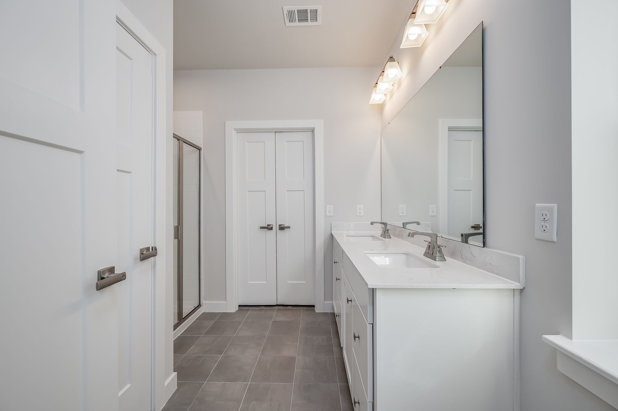 9016 Nestling Ridge College Grove, TN 37046 - Photo 26 of 30 a bathroom with a sink and mirror