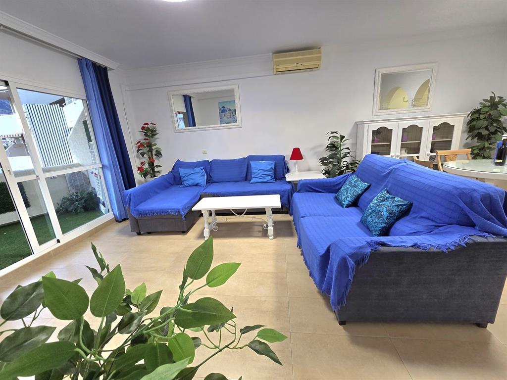 Benalmadena-malaga Av Del Parque3 Torre1 Planta7, Unit 701 Blackstock, 0 29014 - Photo 13 of 33 a living room with furniture fireplace and rug