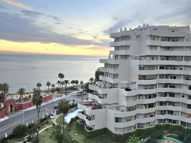 a view of building with ocean view