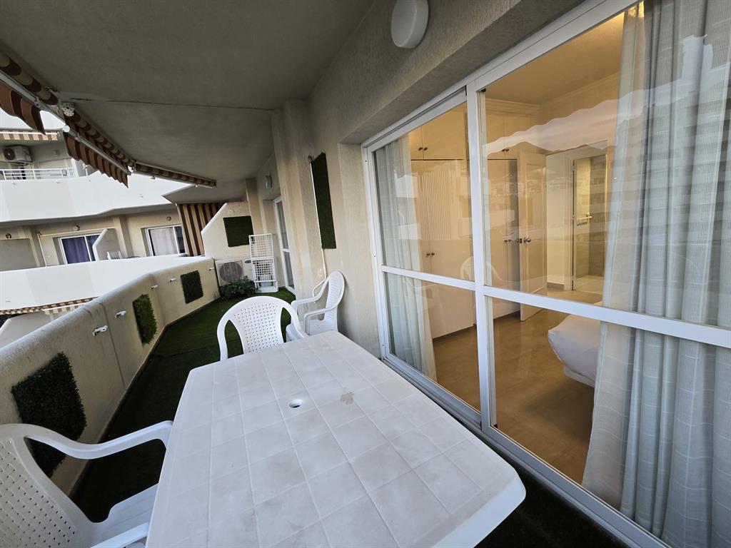 Benalmadena-malaga Av Del Parque3 Torre1 Planta7, Unit 701 Blackstock, 0 29014 - Photo 29 of 33 a view of living room with furniture and large window