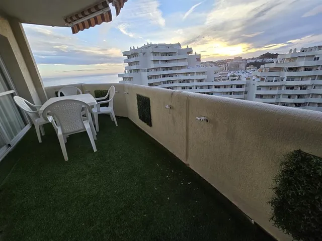 a view of a chairs and table in the terrace