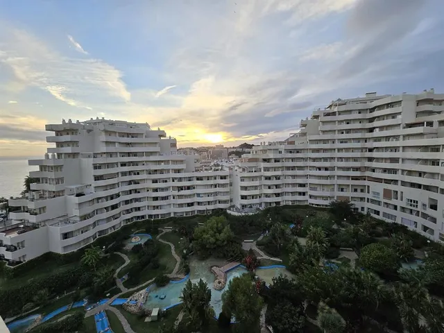 a view of a building with a street