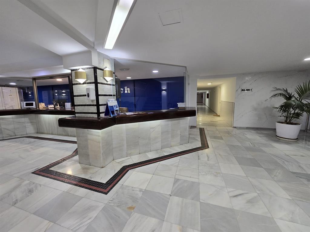 Benalmadena-malaga Av Del Parque3 Torre1 Planta7, Unit 701 Blackstock, 0 29014 - Photo 4 of 33 a living room with stainless steel appliances lots of white furniture