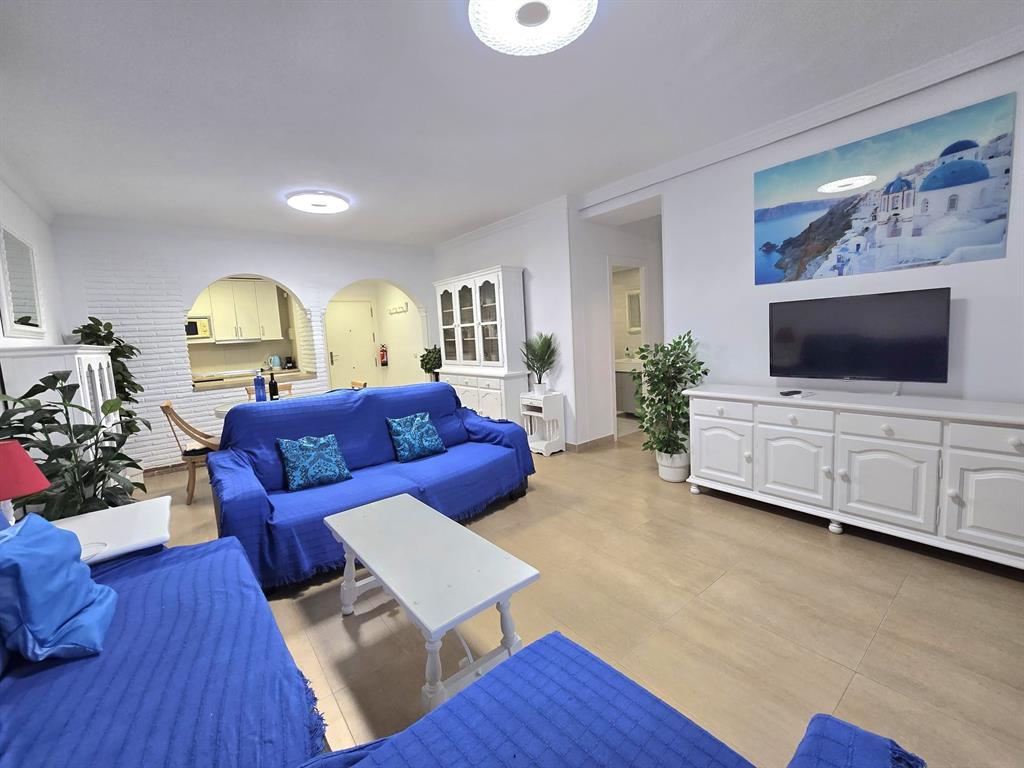 Benalmadena-malaga Av Del Parque3 Torre1 Planta7, Unit 701 Blackstock, 0 29014 - Photo 8 of 33 a living room with furniture and a flat screen tv