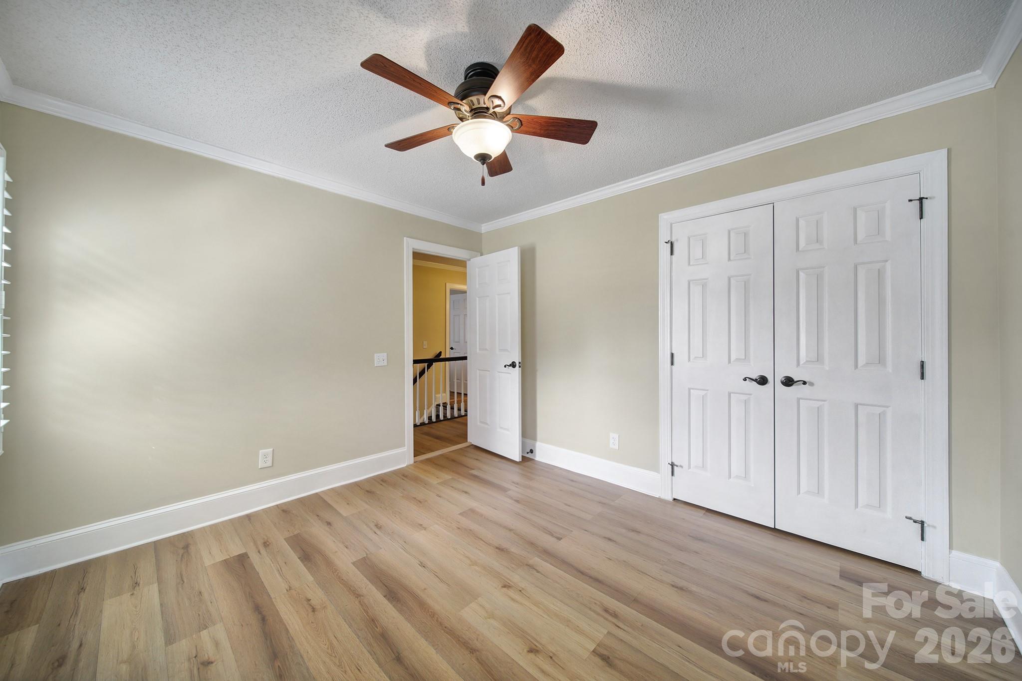 2160 Crosstrail Ridge Rock Hill, SC 29732 - Photo 17 of 37 a view of an empty room with wooden floor