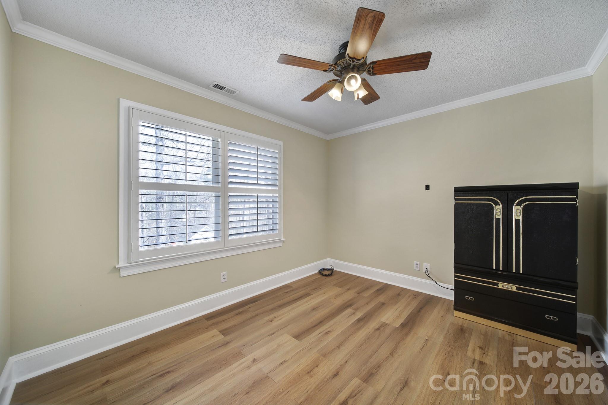 2160 Crosstrail Ridge Rock Hill, SC 29732 - Photo 18 of 37 a view of empty room with wooden floor and fan