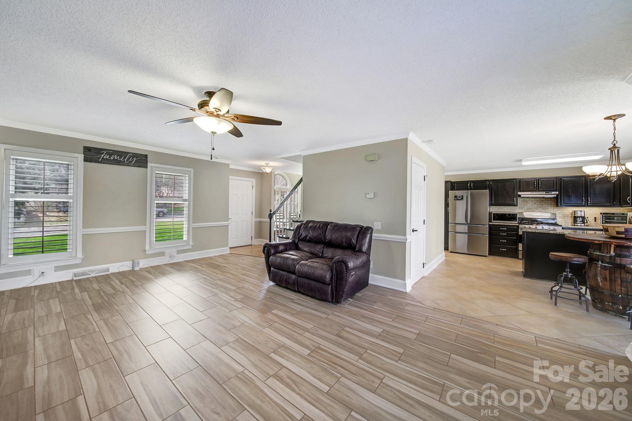 2160 Crosstrail Ridge Rock Hill, SC 29732 - Photo 5 of 37 a living room with furniture and a wooden floor