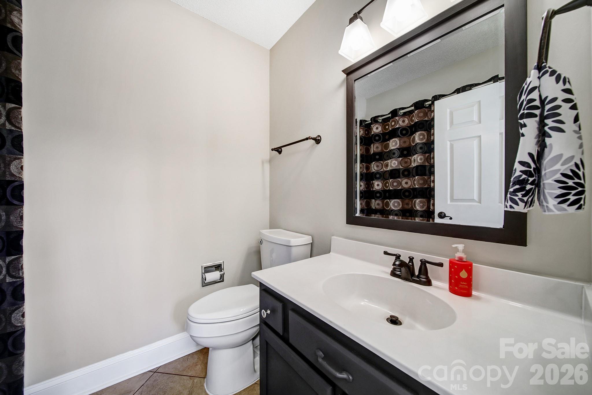 2160 Crosstrail Ridge Rock Hill, SC 29732 - Photo 8 of 37 a bathroom with a sink vanity mirror and toilet