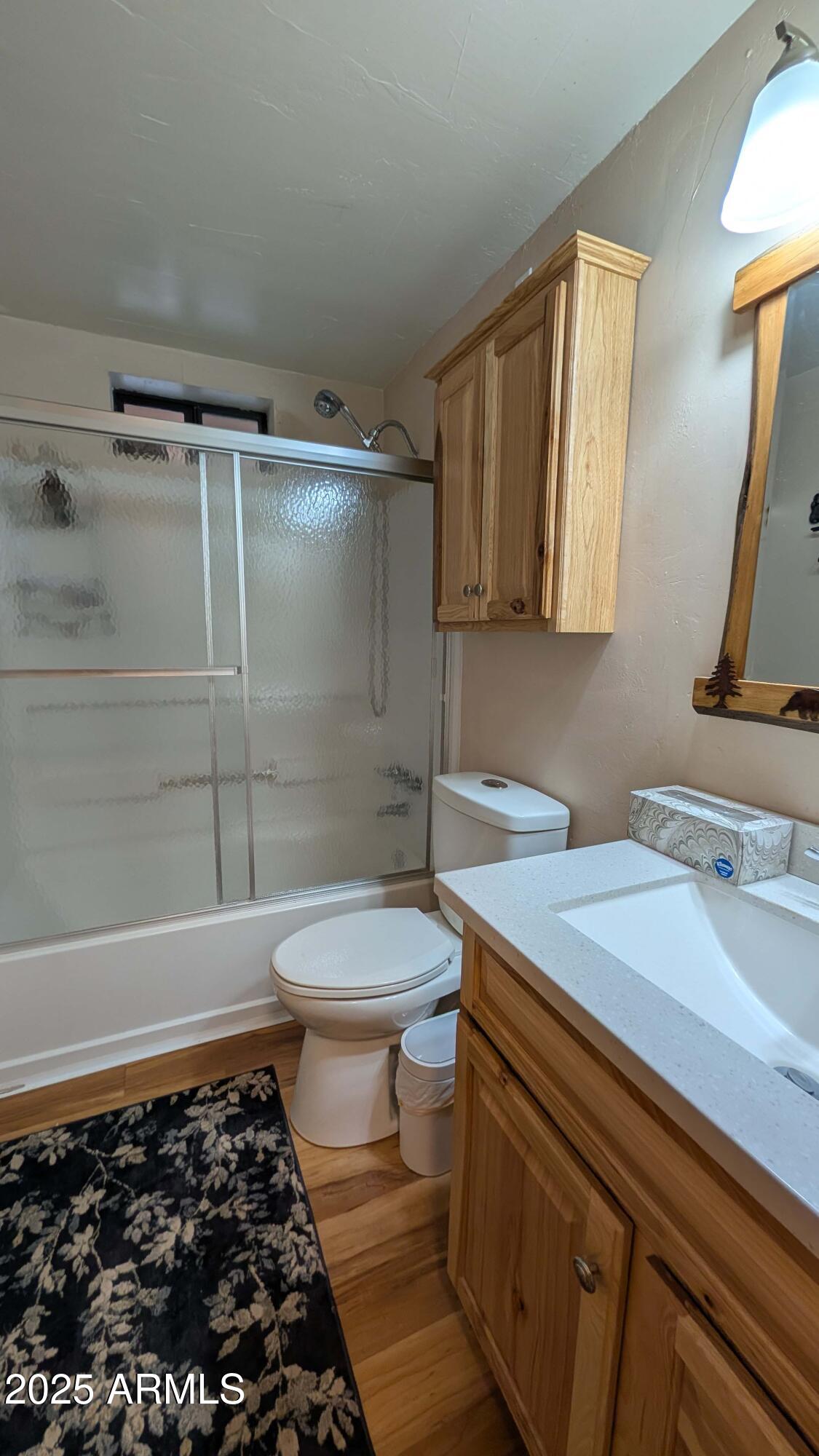 2425 Tall Trees Loop Forest Lakes, AZ 85931 - Photo 19 of 43 a bathroom with a sink toilet and shower