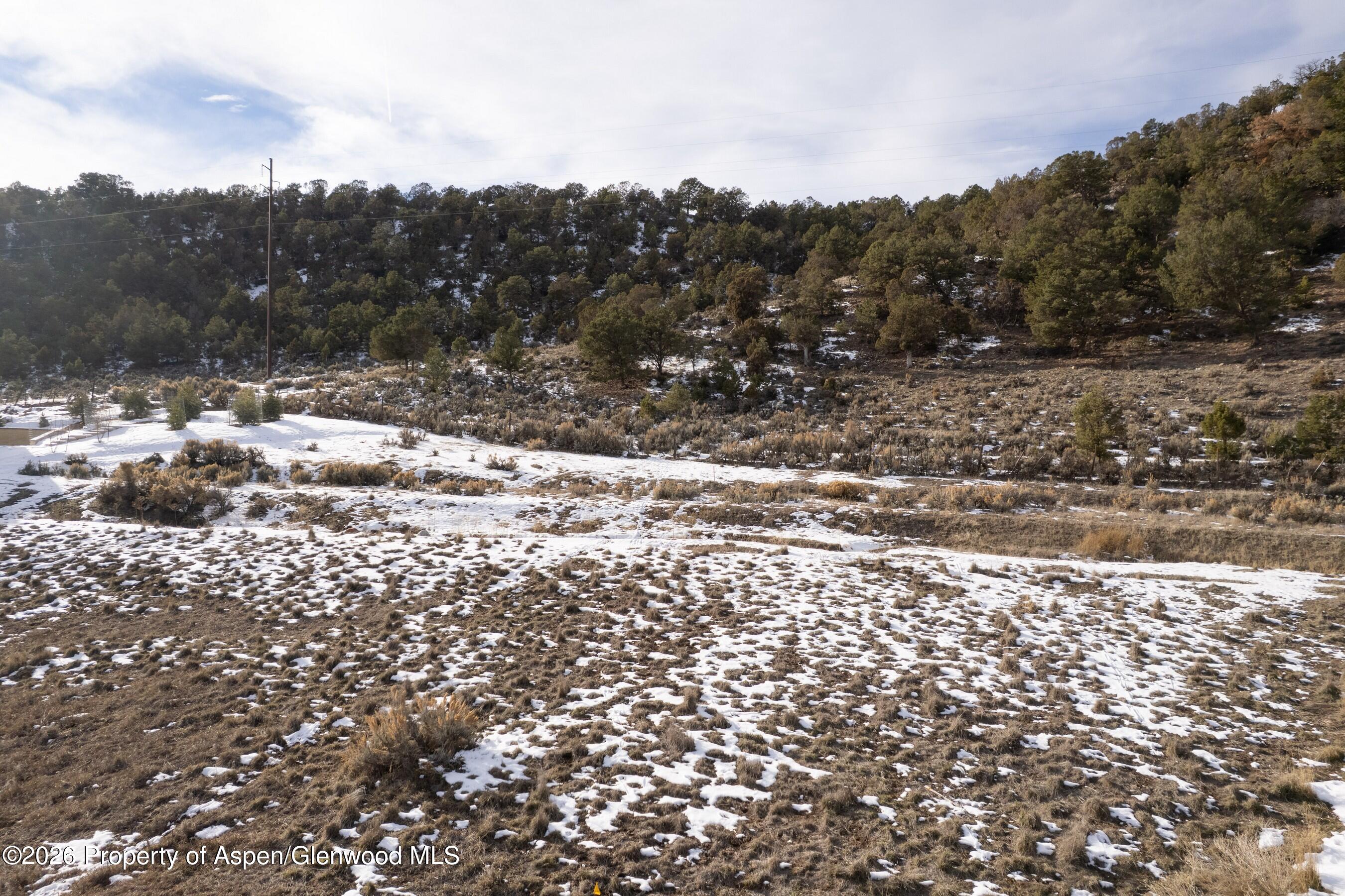 741 Perry Ridge Carbondale, CO 81623 - Photo 9 of 9 a view of a road with a house in the background