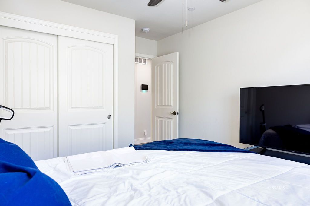 1229 South Ranger Street Ridgecrest, CA 93555 - Photo 14 of 36 a bedroom with a bed and a closet