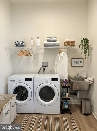 a utility room with dryer and washer