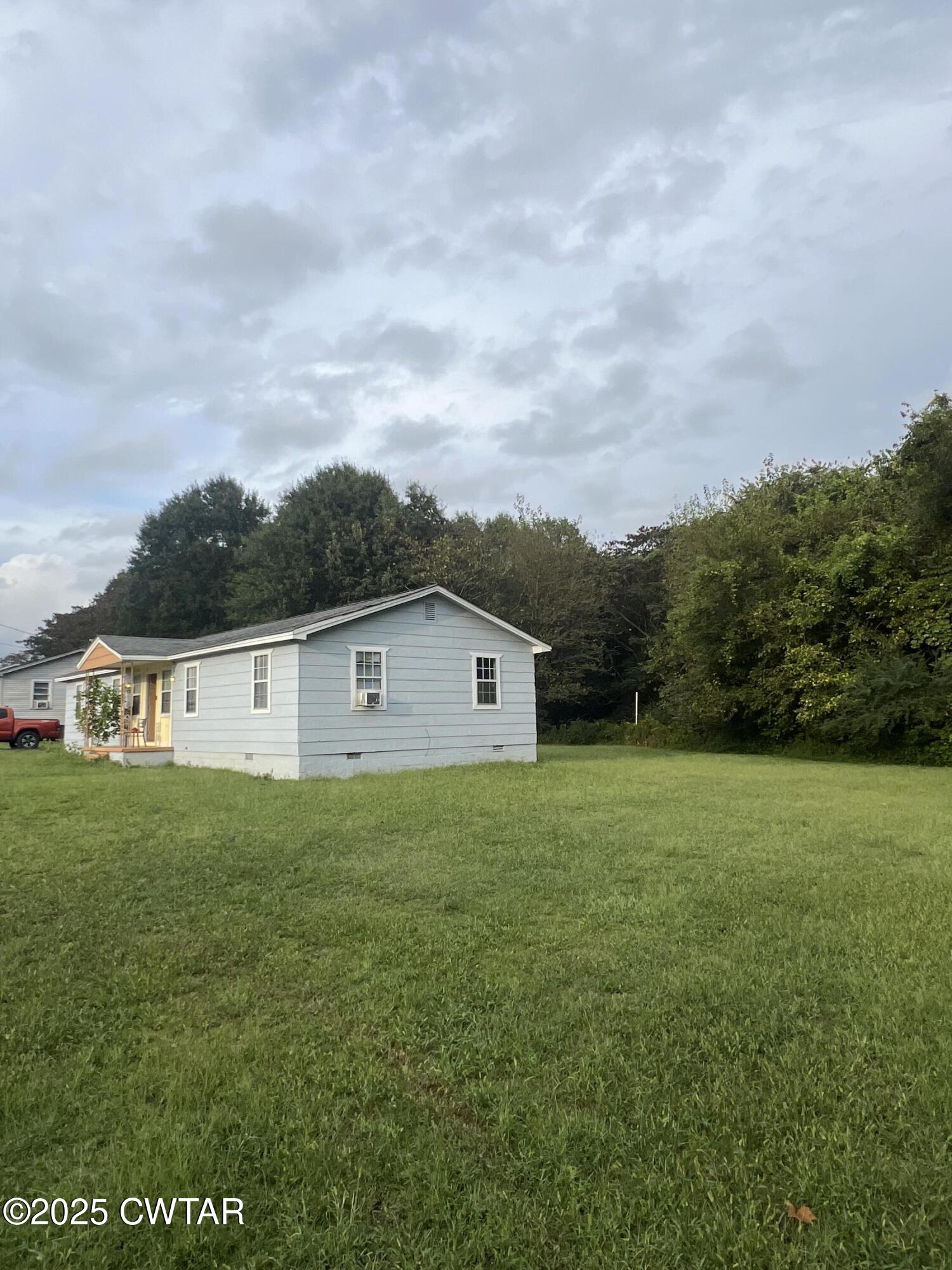 134 Liddon Street Jackson, TN 38301 - Photo 2 of 13 a view of a yard in front of the house