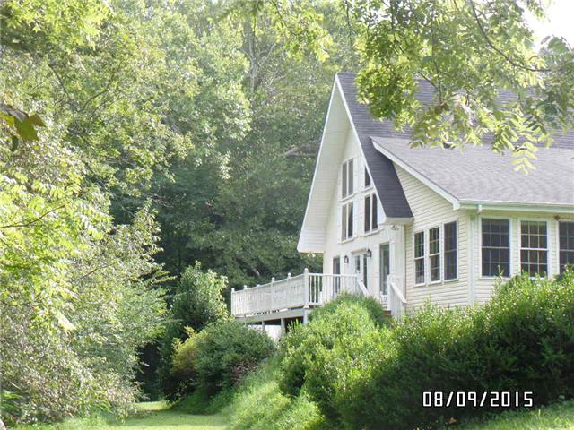1410 Spring Creek Road Chapmansboro, TN 37035 - Photo 1 of 16 Front