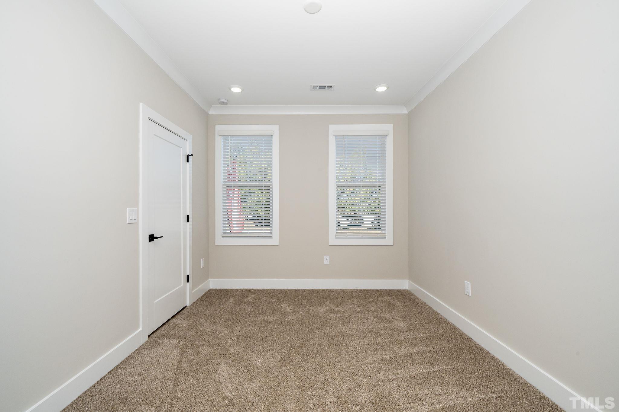6104 Fox Raleigh, NC 27616 - Photo 16 of 54 an empty room with windows