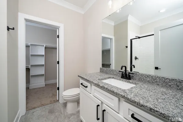 a view of an empty walk in closet