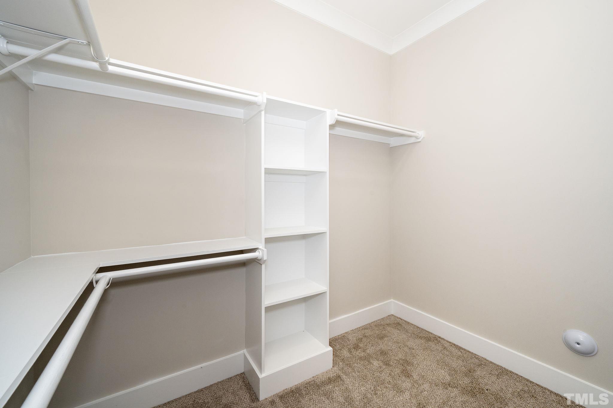 6104 Fox Raleigh, NC 27616 - Photo 18 of 54 a view of an empty walk in closet