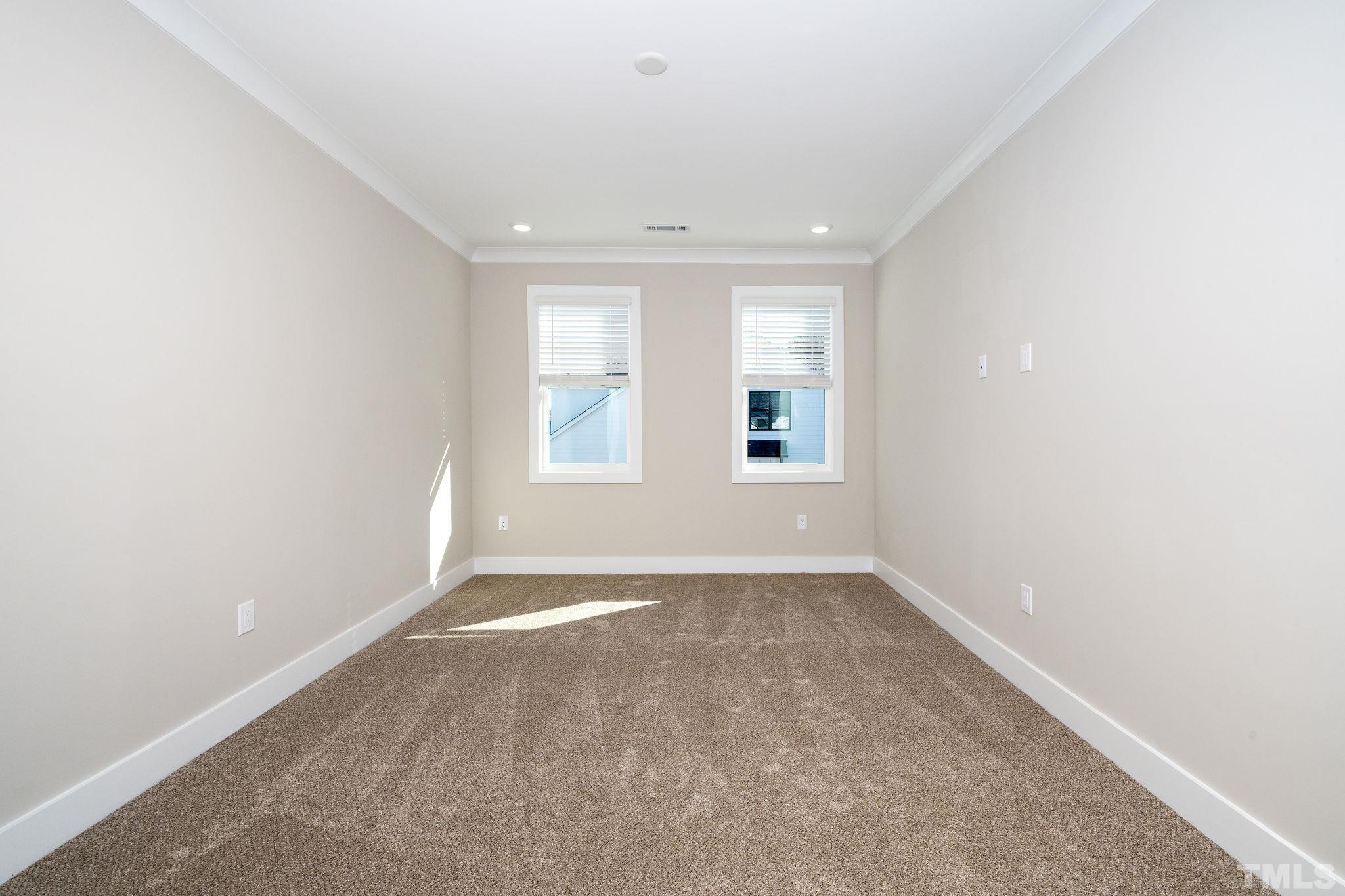 6104 Fox Raleigh, NC 27616 - Photo 19 of 54 an empty room with windows