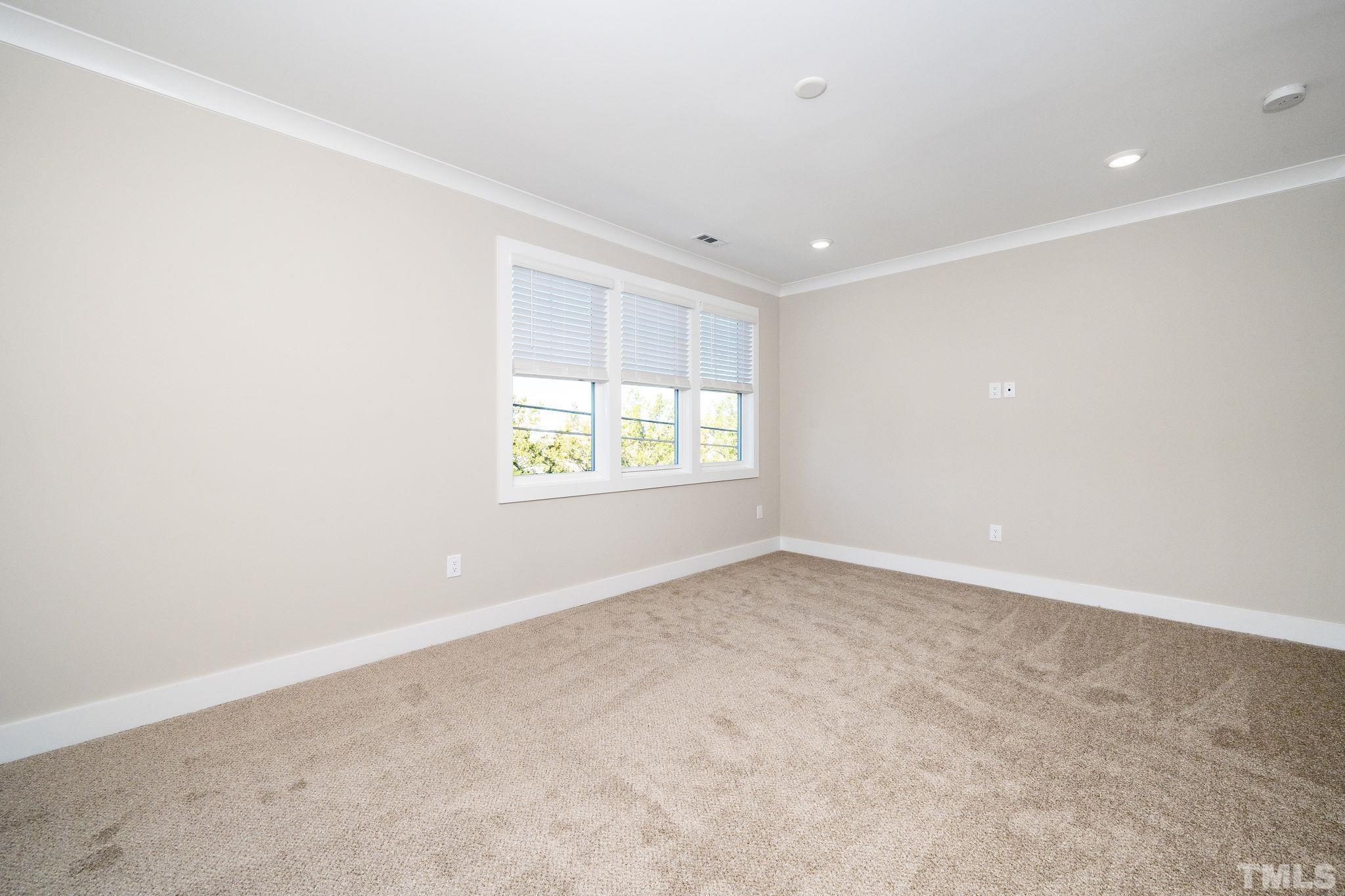 6104 Fox Raleigh, NC 27616 - Photo 24 of 54 an empty room with windows
