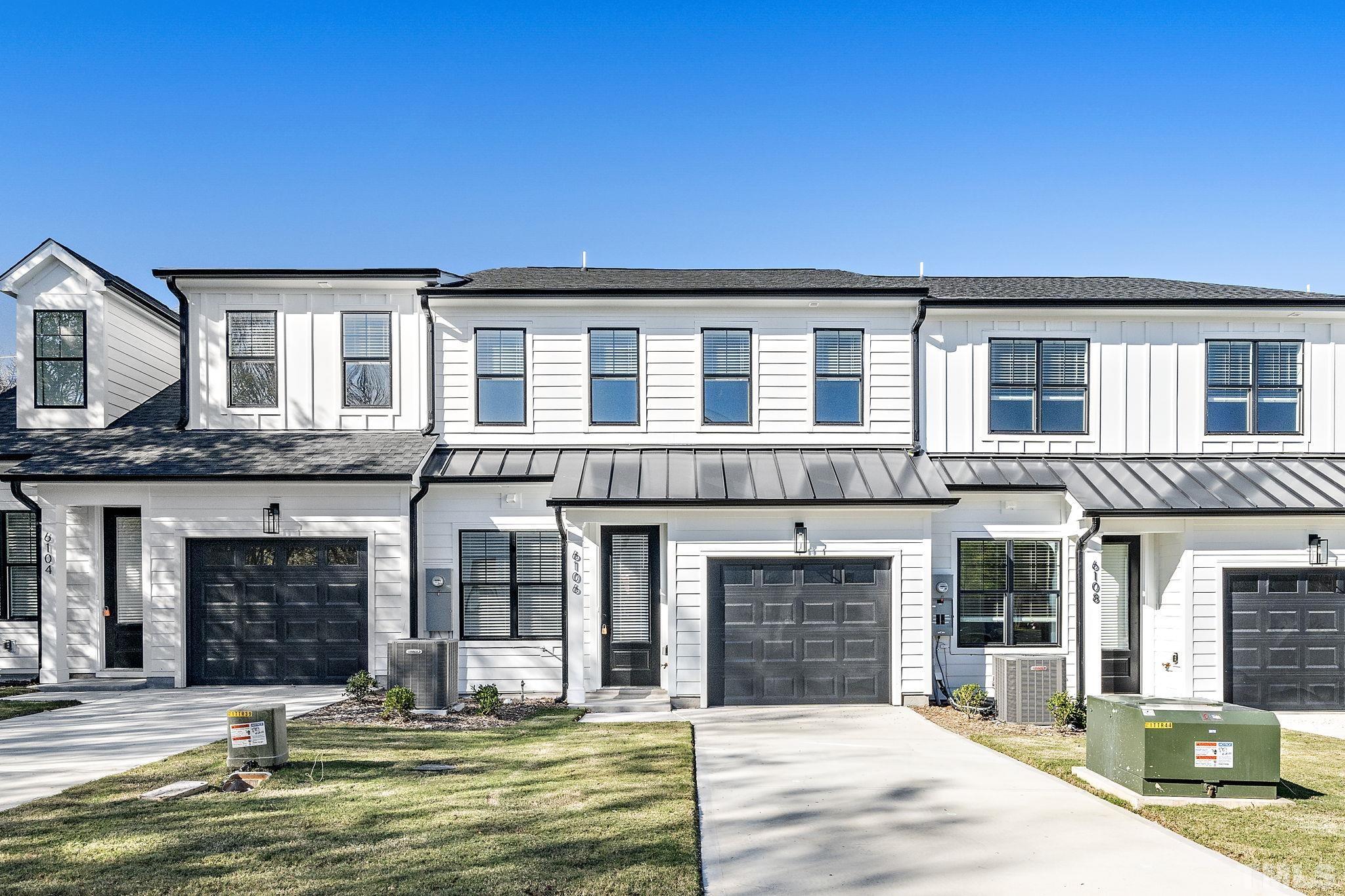 6104 Fox Raleigh, NC 27616 - Photo 25 of 54 a front view of a house with a porch