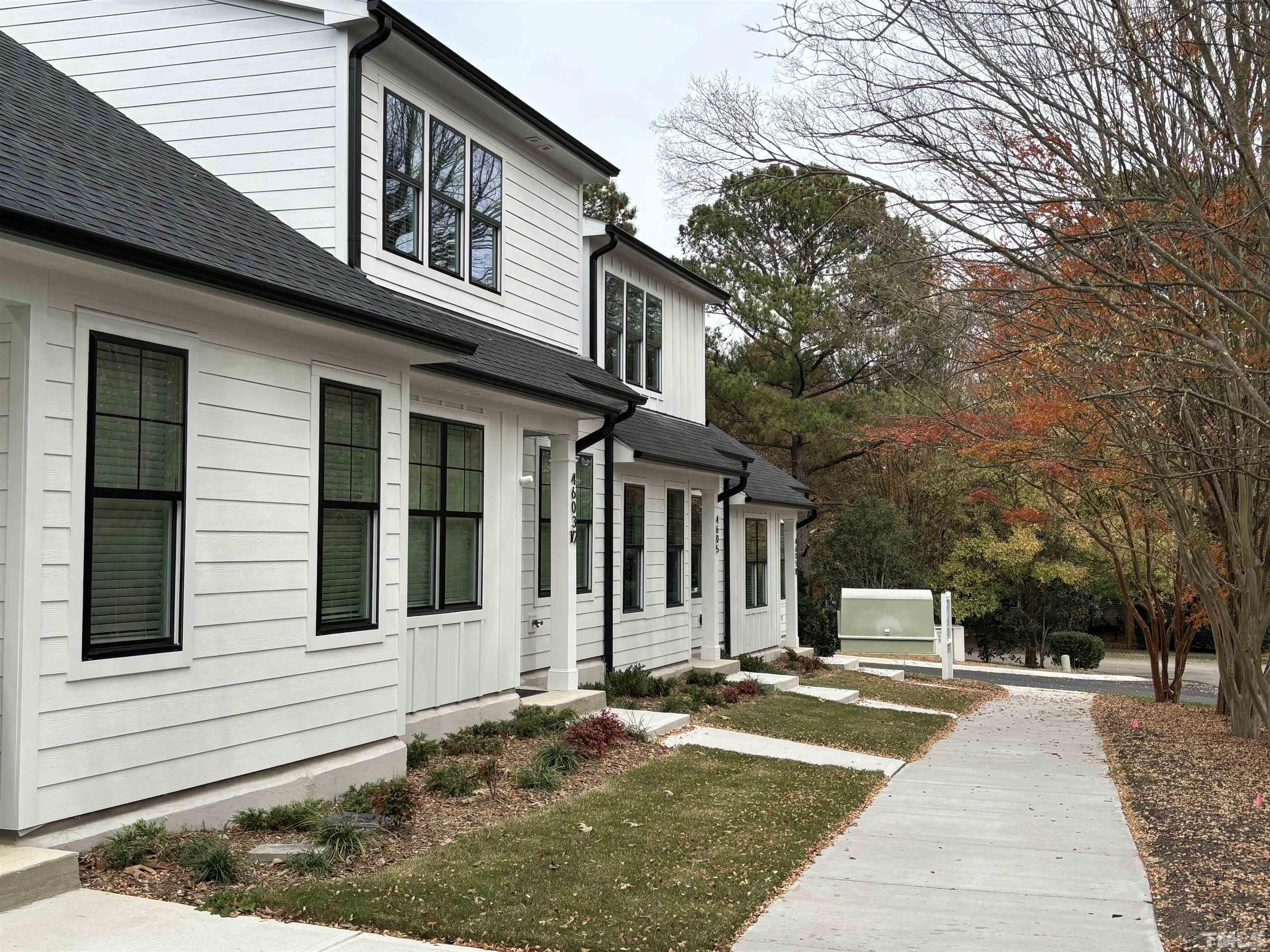 6104 Fox Raleigh, NC 27616 - Photo 27 of 54 a front view of a house with a yard