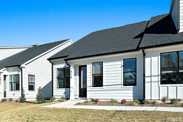 a front view of house with a yard