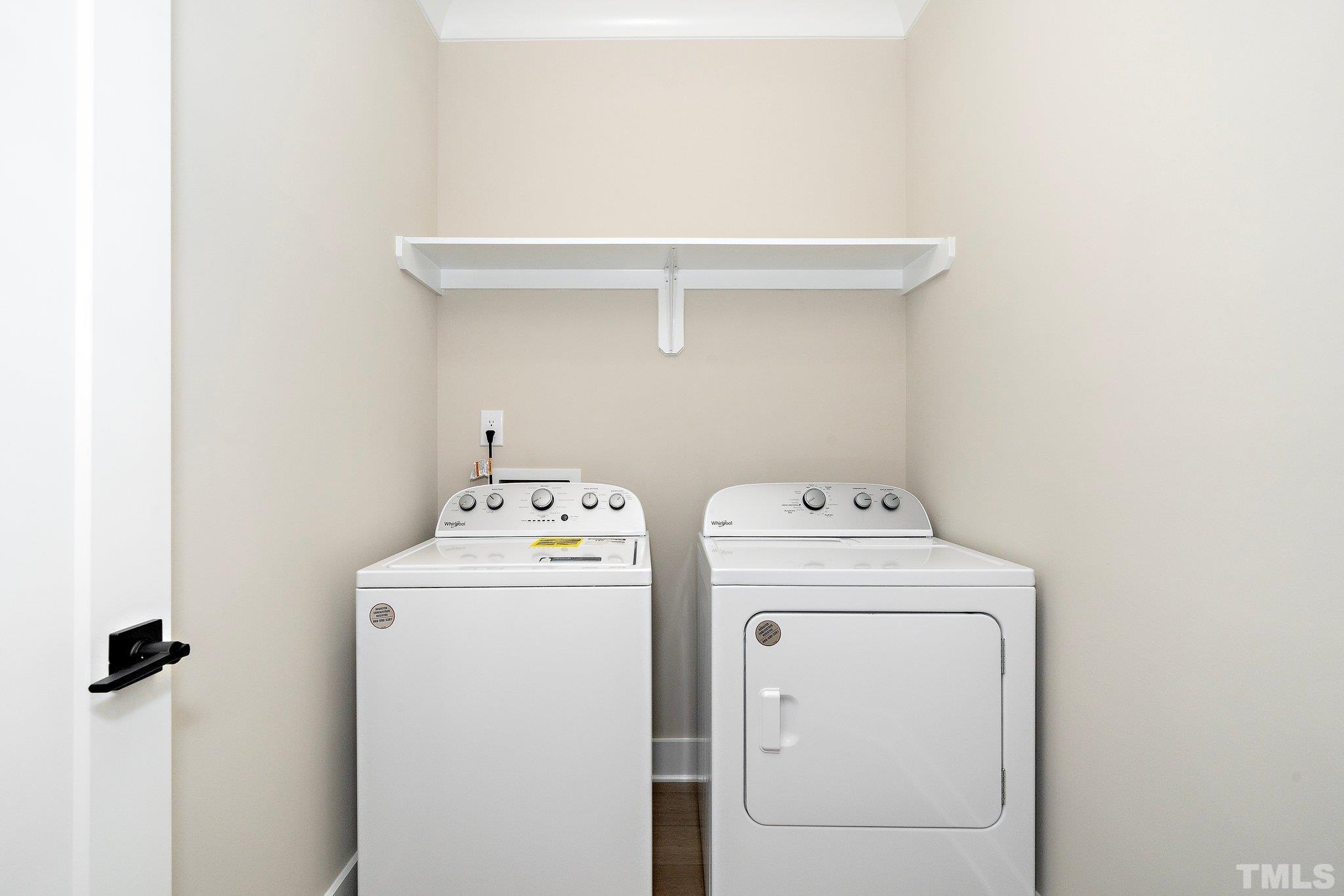6104 Fox Raleigh, NC 27616 - Photo 42 of 54 a utility room with dryer and washer